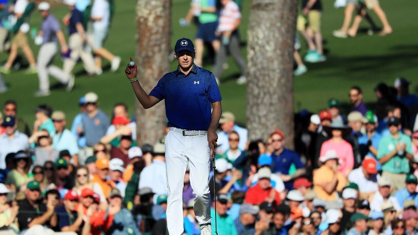 Jordan Spieth of the United States reacts to his birdie on the 15th green during Saturday’s third round of the Masters. (Andrew Redington/Getty Images)