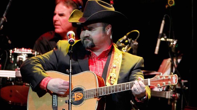Daryle Singletary performs during Playin' Possum! The Final No Show Tribute To George Jones - Show at Bridgestone Arena on November 22, 2013 in Nashville, Tennessee.  (Photo by Terry Wyatt/Getty Images)
