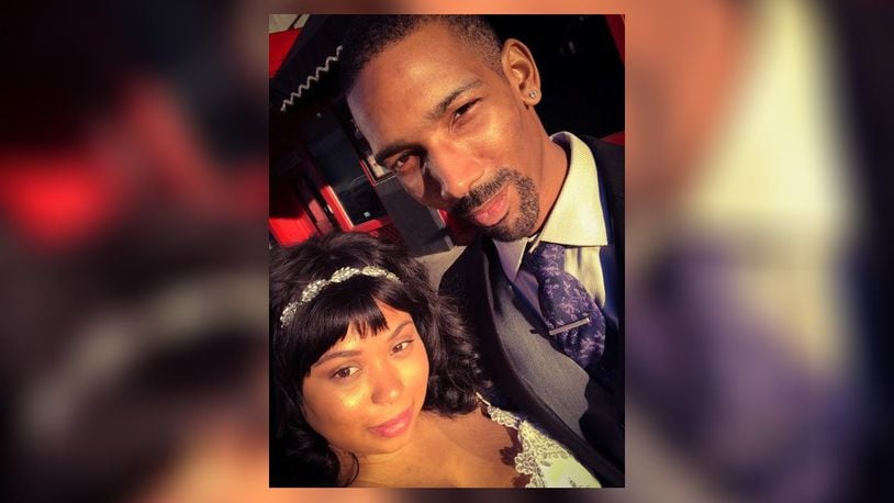 Brandon Cooper with his wife, Brittney Cooper. Brandon Cooper was shot and killed in January 2022 while driving for Lyft. / CONTRIBUTED