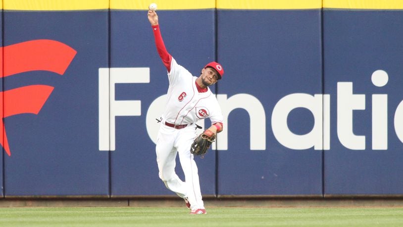 Billy Hamilton throws a ball back to the infield during a game against the New York Mets on May 7, 2018, at Great American Ball Park in Cincinnati.