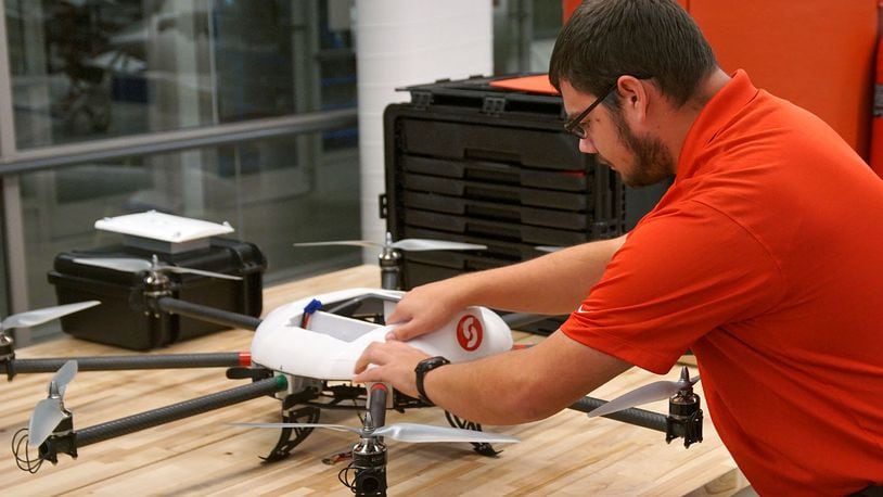 Casey Dearth, a Sinclair student from Eaton, works on a drone in a lab at the community college in November. Dearth is studying for a degree in unmanned aerial systems. He said he would support Sinclair if it moved forward with the idea to offer a bachelor’s degree in UAS. Sinclair would first need approval from the state for the program.