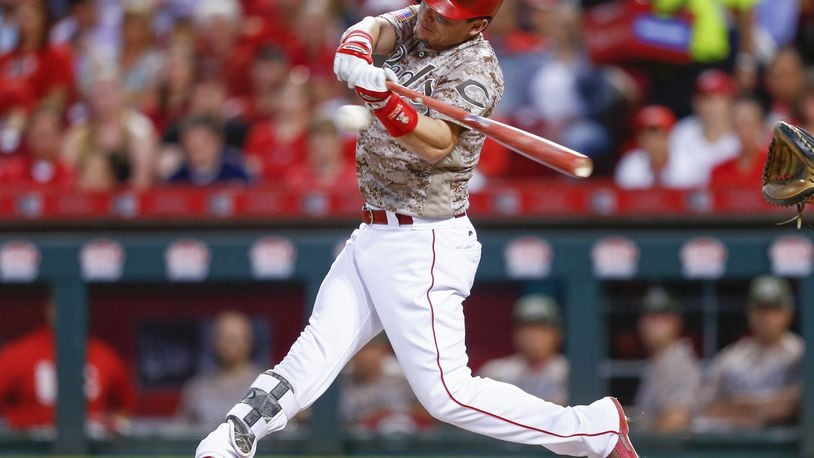 CINCINNATI, OH - MAY 06: Scooter Gennett #4 of the Cincinnati Reds hits his third home run of the game in the eighth inning against the St. Louis Cardinals at Great American Ball Park on June 6, 2017 in Cincinnati, Ohio. (Photo by Michael Hickey/Getty Images)