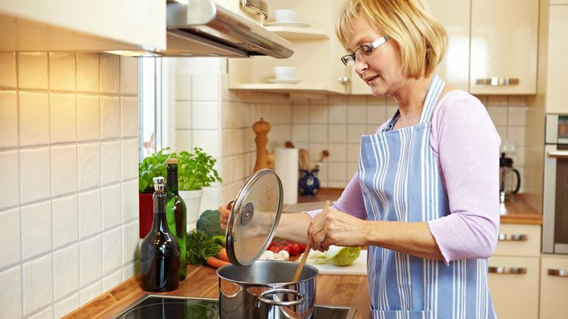 Electric cooktops can be safer options for for seniors who are choosing to stay in their homes as they age. SHUTTERSTOCK