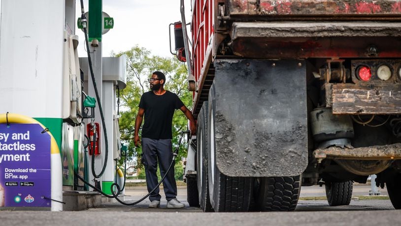 Gerrett Brady said he uses around 30 gallons of diesel a day in his large dump truck for work. Fuel prices have dropped for 11 consecutive weeks but experts say there could be a temporary bump in the road ahead. JIM NOELKER/STAFF