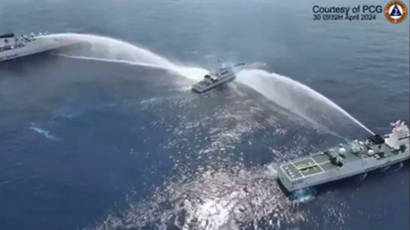 In this image made from video provided by the Philippine Coast Guard, Philippine Coast Guard vessel, BRP BAGACAY (MRRV-4410) is water cannoned by Chinese Coast Guards as it tried to approach the waters near Scarborough Shoal locally known as Bajo De Masinloc at the South China Sea on Tuesday April 30, 2024. (Philippine Coast Guard via AP)