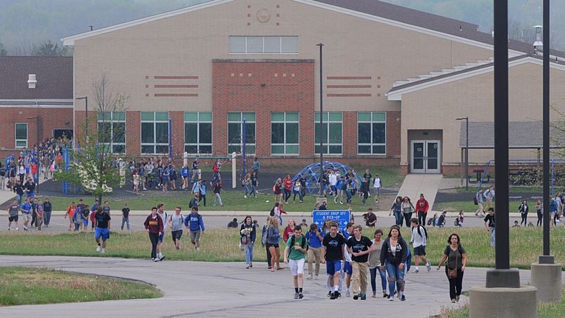 Springboro schools are among districts in Warren and Montgomery counties using social network scans for threats. Pictured is a 2016 evacuation of Springboro High School after a bomb threat.Staff photo by Marshall Gorby
