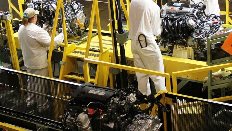 In this file photo from 2013, Honda workers at the company's Anna engine plant in Shelby County work on engines for the Honda Accord. Honda photo