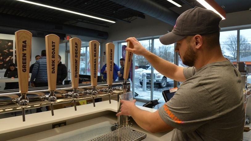 Dunkin' Donuts' new next-generation concept stores are now pouring cold beverages through a tap system. CONTRIBUTED