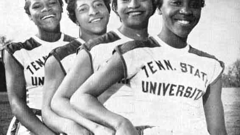 Lucinda Williams (right) poses with Tennessee State Tigerbelles teammates (left to right) Isabelle Daniels, Margaret Matthews and  Barbara Jones. Photo courtesy of Tennessee State University.