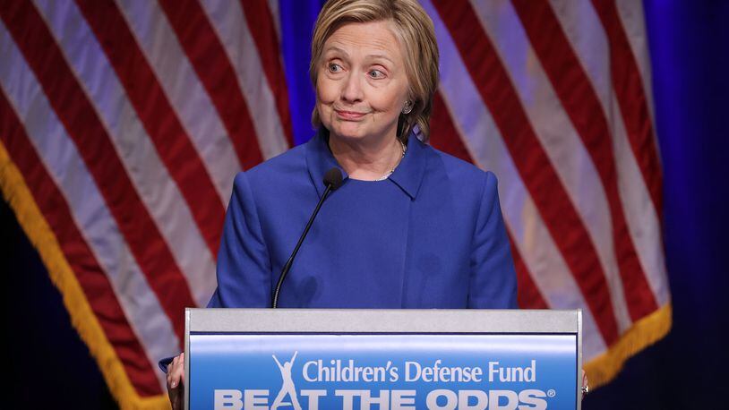 WASHINGTON, DC - NOVEMBER 16: Former Secretary of State Hillary Clinton delivers remarks while being honored during the Children's Defense Fund's Beat the Odds Celebration at the Newseum November 16, 2016 in Washington, DC. This was the first time Clinton had spoken in public since conceeding the presidential race to Republican Donald Trump. (Photo by Chip Somodevilla/Getty Images)