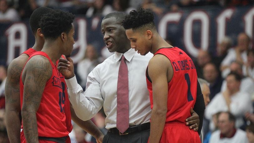 Dayton’s Anthony Grant huddles with his players during a game against Saint Mary’s on Tuesday, Dec. 19, 2017, at McKeon Pavilion in Moraga, Calif. David Jablonski/Staff