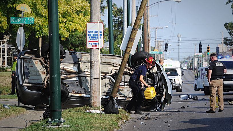 A man was taken to the hospital following a two-vehicle crash at Main Street and Kurtz Avenue in Dayton on Wednesday, Sept. 23, 2020. STAFF PHOTO / MARSHALL GORBY