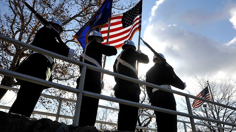 Members of the Wright State University ROTC present the colors during the Clark County Veterans Day program in 2020 at Veterans Park in Springfield. Staff photo by Bill Lackey