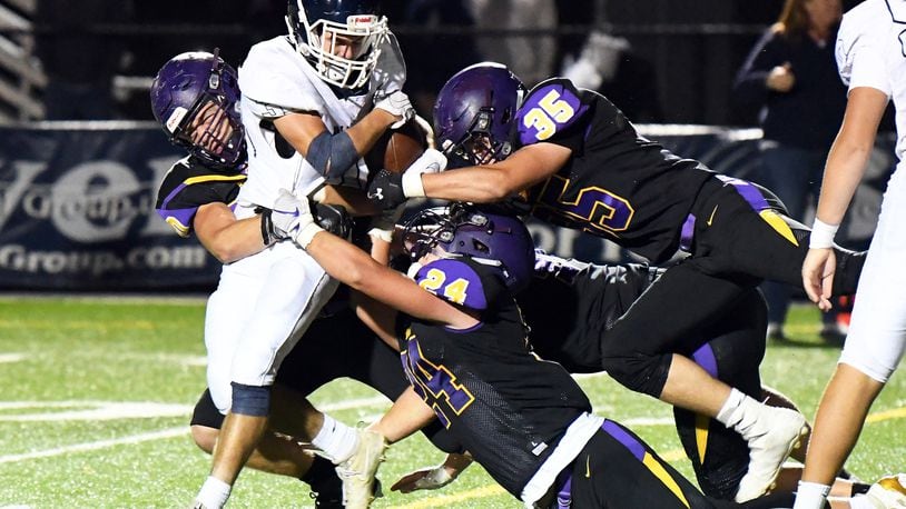 The Bellbrook defense stuffs a Valley View runner during Friday night’s game at Bellbrook. Nick Falzerano/CONTRIBUTED