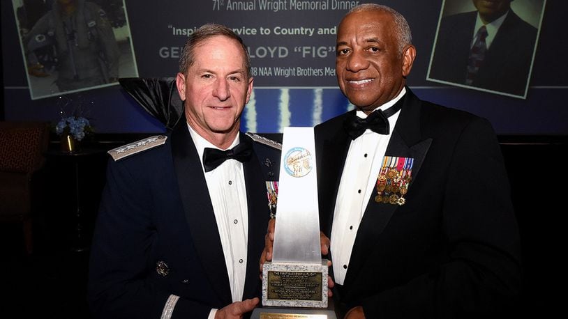 Air Force Chief of Staff Gen. David L. Goldfein and retired Gen. Lloyd Newton, the 2018 Wright Brothers Memorial Trophy winner, pose for a photo after the 71st National Aeronautics Association Wright Brothers Memorial Dinner in Washington, D.C., Dec. 14. (U.S. Air Force photo/Staff Sgt. Rusty Frank)
