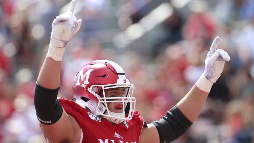 Miami Redhawks left tackle Tommy Doyle during an NCAA football game on Saturday, Sept. 7 , 2019 in Oxford , OH . (AP Photo/Tony Tribble)