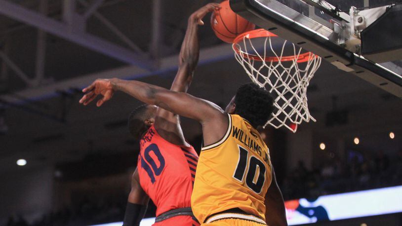 Dayton's Jalen Crutcher dunks against Virginia Commonwealth in the first half on Tuesday, Feb. 18, 2020, at the Siegel Center in Richmond, Va.