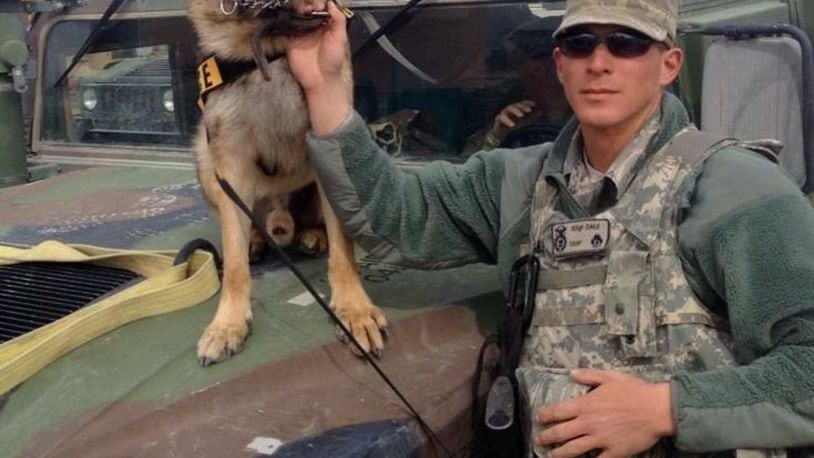 88 Security Forces Squadron MilitaryWorking Dog handler Staff Sgt. Seth Dale poses with military working dog Blecki during a military exercise. Dale and Blecki traveled extensively during the 2016 election season in support of the U.S. Secret Service protective mission. (U.S.Air Force courtesy photo)