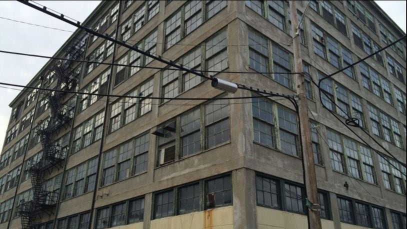 The developer of the Wheelhouse Lofts hopes to transform the six-story building at 15 McDonough St. into offices. CORNELIUS FROLIK / STAFF
