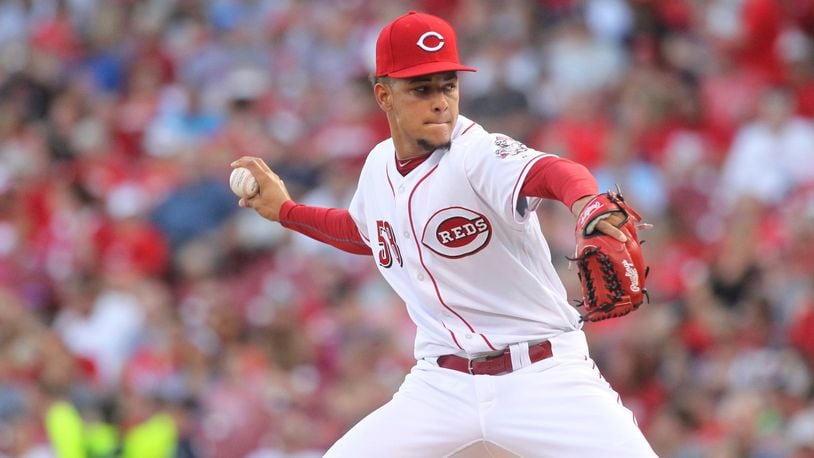 Reds starter Luis Castillo pitches against the Brewers last June at Great American Ball Park in Cincinnati. DAVID JABLONSKI / STAFF