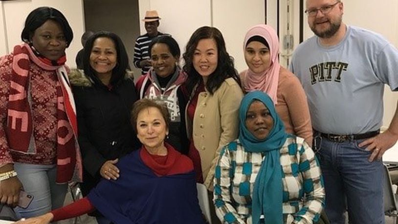 Karin Hirschkatz, a volunteer at St. John’s ESOL (English For Speakers of Other Languages) program, is pictured (bottom left) with her students from around the world. CONTRIBUTED