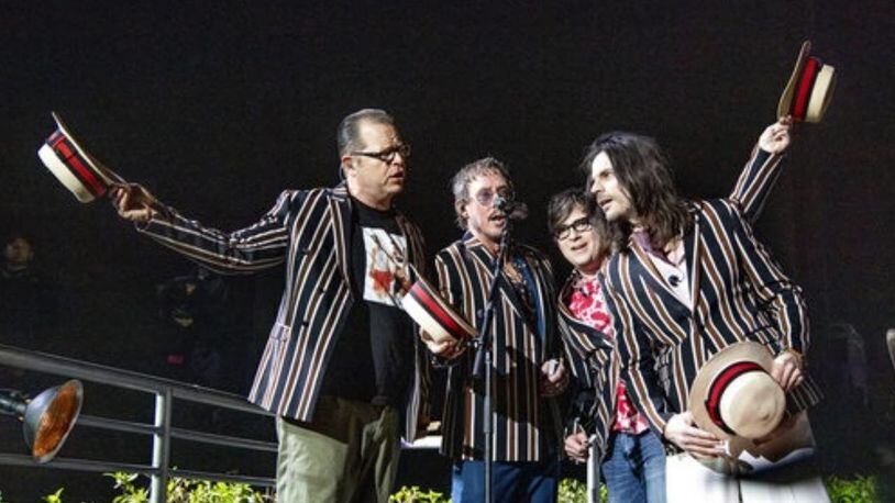 Weezer performed in Minot, North Dakota, on Saturday night, and some concertgoers helped a woman in a wheelchair enjoy the band by lifting her and the chair onto their shoulders.