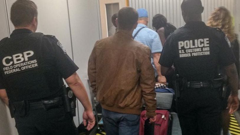 Atlanta U.S. Customs and Border Protection agents escort Gentian Kurdina, 23, after the Albanian national deserted his cruise ship in Louisiana and boarded a train bound for New York City. (Photo: U.S. Customs and Border Protection)