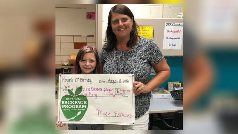 John F. Kennedy Elementary School guidance counselor Tracey Nissen (right) has been involved the Kettering Backpack Program for more than 10 years. CONTRIBUTED