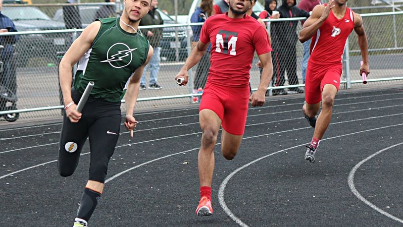 Northmont’s Kameron Gover (left) battles Trotwood’s Dallas Daniels (middle) and Princeton’s CJ Henderson in the 4x200 relay. Gover won the 100 and 200 dashes and ran legs on the winning 4x200 and 4x100 relay teams at the Jack Lintz Invitational on Saturday. GREG BILLING / CONTRIBUTED