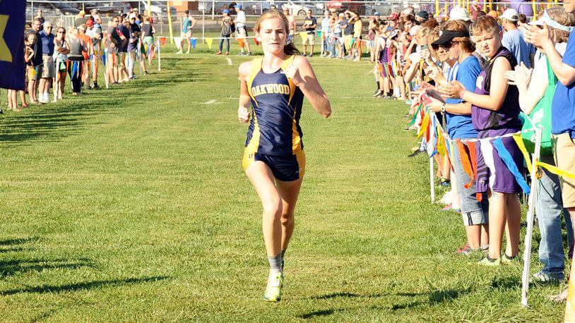 Oakwood sophomore Elizabeth Vaughn won the Bellbrook Invitational cross-country meet Saturday with a 47-second victory. GREG BILLING / CONTRIBUTED