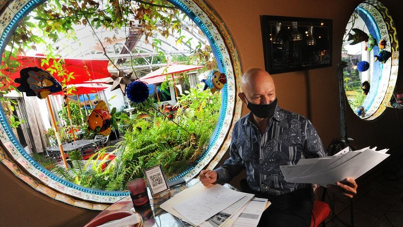 Bill Castro, owner of El Meson, has been inundated with unemployment claims being filed fraudulently in his restaurant's name. MARSHALL GORBY\STAFF