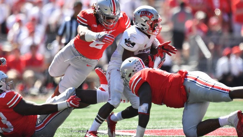 COLUMBUS, OH - SEPTEMBER 23:  Chase Young #2 of the Ohio State Buckeyes dives to make a tackle on Lexington Thomas of the UNLV Rebels in the second quarter at Ohio Stadium on September 23, 2017 in Columbus, Ohio.  (Photo by Jamie Sabau/Getty Images)
