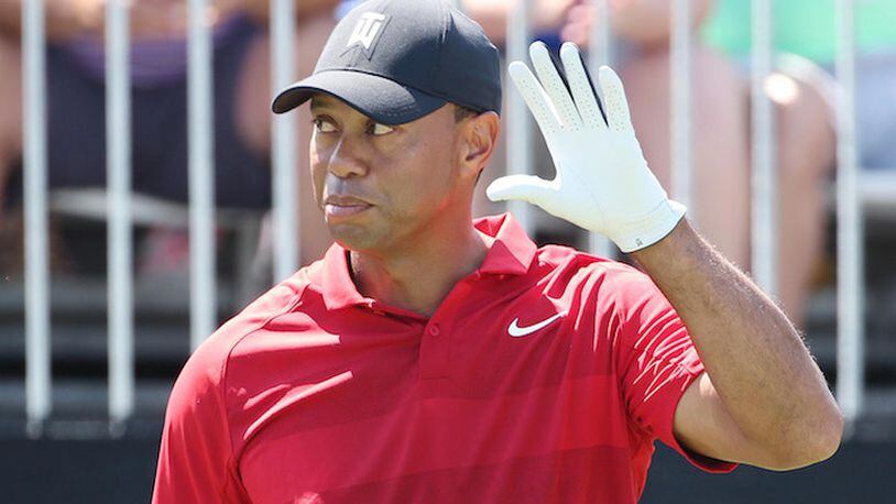 Tiger Woods acknowledges the cheering crowd before teeing off during the Arnold Palmer Invitational on March 18, 2018, at Bay Hill Club &amp; Lodge in Orlando, Fla. (Stephen M. Dowell/Orlando Sentinel/TNS)