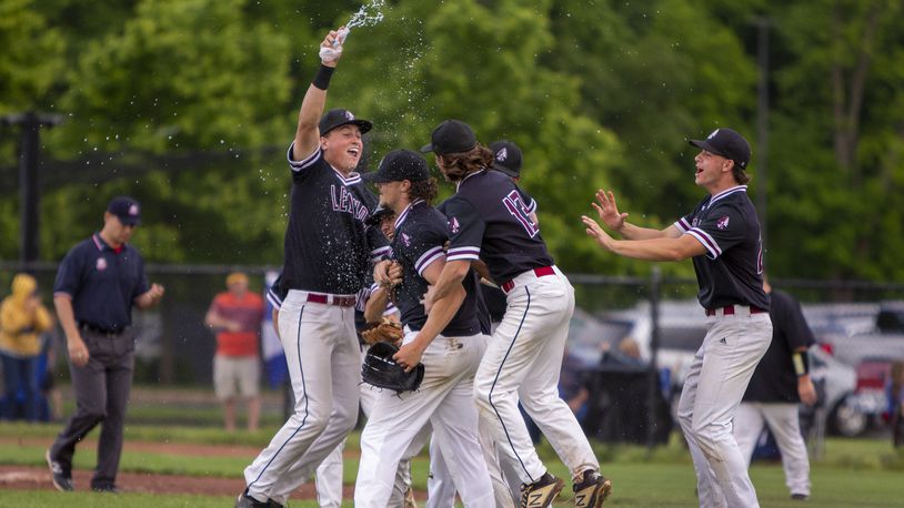 Lebanon celebrates a victory against Butler in a Division I district final on Friday, May 28, 2022, in Beavercreek, Photo by Jeff Gilbert