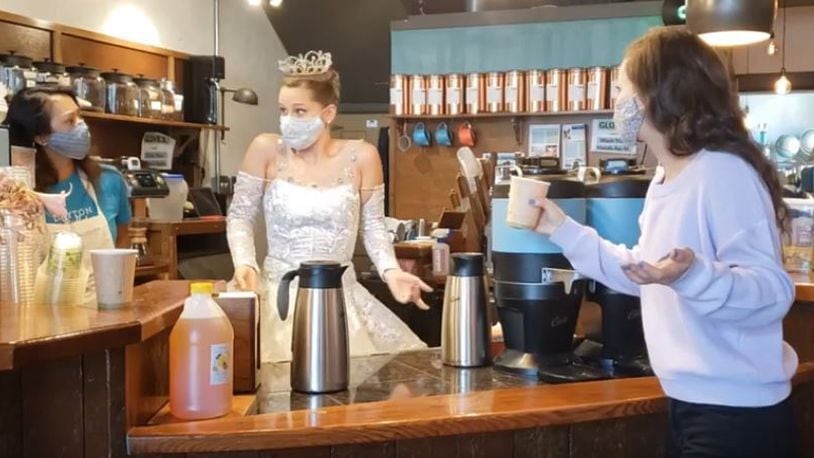 The humorous six-minute video titled “Nutcracker Characters — Getting By in 2020″ was made by Dayton Ballet wardrobe supervisor Lyn Baudendistel and her husband, Tommy. Here, the Snow Queen works at Ghostlight Coffee. CONTRIBUTED