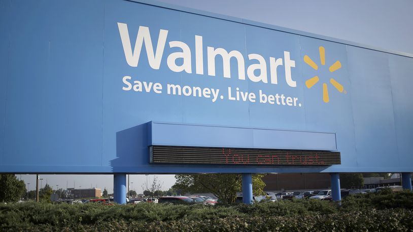 A sign outside of the Wal-Mart Stores Inc. headquarters building in Bentonville, Ark. Luke Sharrett, Bloomberg
