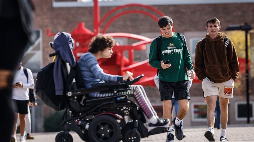 Students at Wright State University walk to and from class at the university Monday October 24, 2022. JIM NOELKER/STAFF