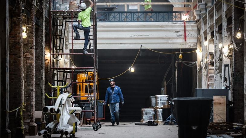 Work continues at the Arcade on the Third Street side of building Wednesday September 27, 2023. The Dayton region sees another month of sturdy employment gains. JIM NOELKER/STAFF