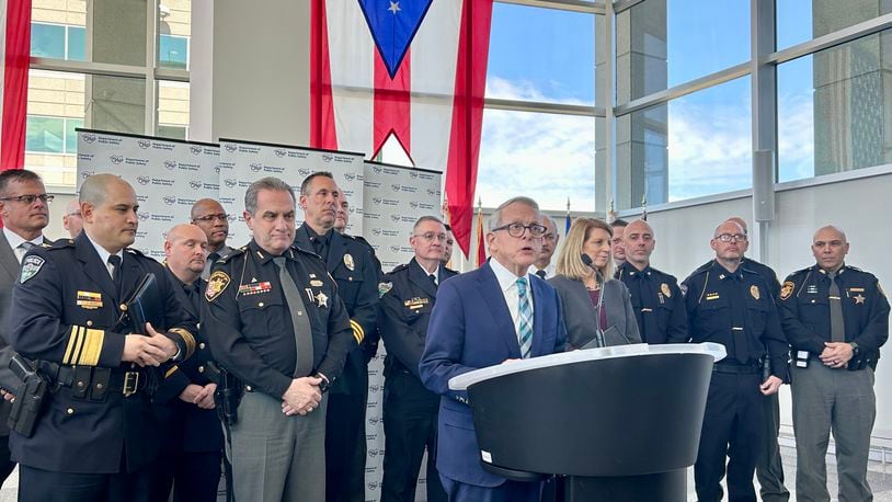 Ohio Republican Gov. Mike DeWine signed an executive order Thursday that created a free law enforcement accreditation program administered by the state. He was joined by leaders of 10 different police agencies across Ohio, including the chiefs of Dayton, Springfield and Fairborn police departments. March 21, 2024.