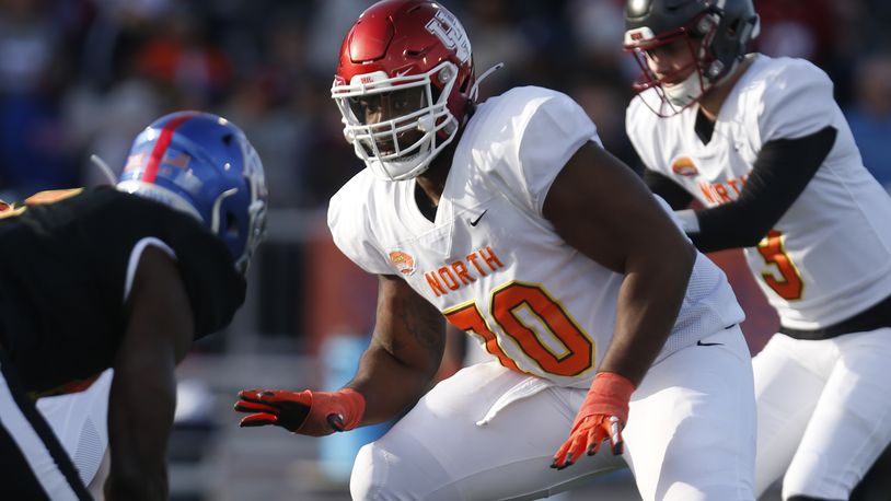 FILE - In this Jan. 25, 2020, file photo, North offensive tackle Josh Jones of Houston (70) is shown playing during the second half of the Senior Bowl college football game in Mobile, Ala. Josh Jones is a possible pick in the NFL Draft which runs Thursday, April 23, 2020, thru Saturday, April 25. (AP Photo/Butch Dill)