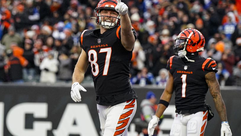 Cincinnati Bengals tight end Tanner Hudson (87) celebrates after a touchdown against the Indianapolis Colts in the second half of an NFL football game in Cincinnati, Sunday, Dec. 10, 2023. (AP Photo/Jeff Dean)