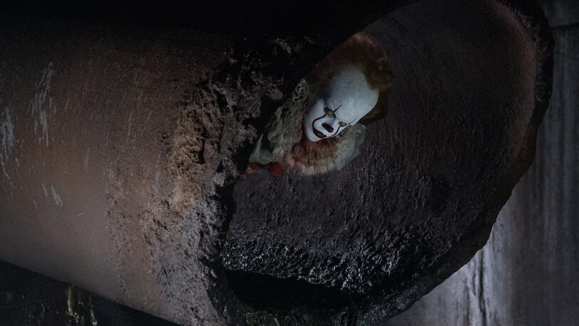 BILL SKARSGÅRD as Pennywise in New Line Cinema's horror thriller "IT," a Warner Bros. Pictures release.