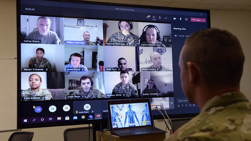 Tech. Sgt. William Klemmer, Airman Leadership School instructor, teaches via distance learning protocol under Health Protection Condition Charlie at Wright-Patterson Air Force Base Sept. 16. Klemmer instructs half of a class of 22 students. (U.S. Air Force photo/Ty Greenlees)