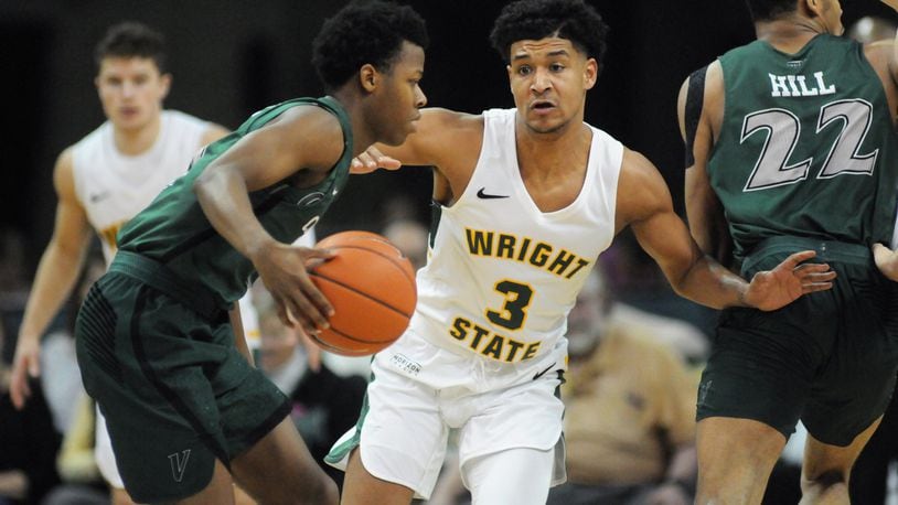 Wright State’s Mark Hughes defends a Cleveland State player during Thursday night’s game at the Nutter Center. Keith Cole/CONTRIBUTED