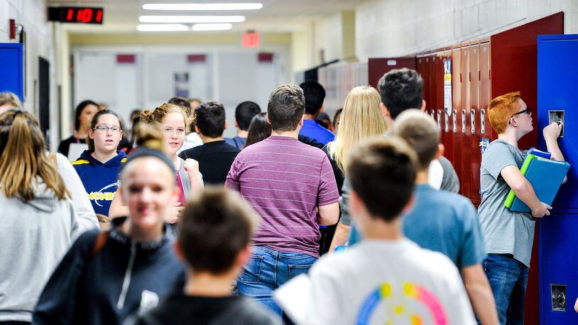 Students change classes in the junior high section of Monroe Junior/Senior High School Tuesday, Oct. 17. Monroe’s school board could decide to move on a new school tax hike and building plan next year as a way to go to handle the district’s growing enrollment. NICK GRAHAM/STAFF