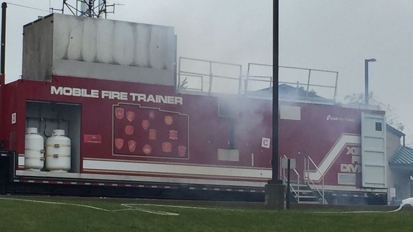 The city of Xenia’s mobile fire trainer was in Beavercreek Thursday, Oct. 20, 2016 where firefighters receive fire training in a safe environment. JAROD THRUSH/STAFF