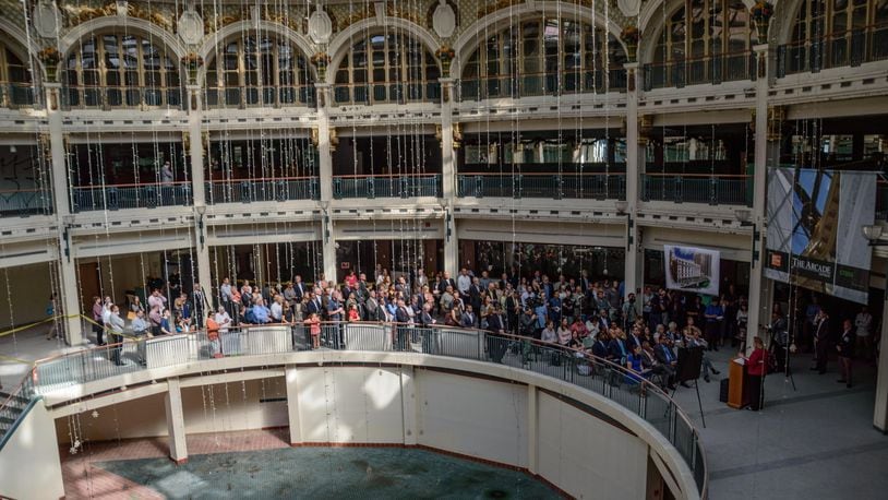 The Dayton Arcade received a $4 million state historic tax credit Tuesday that supporters say takes a massive redevelopment plan closer to reality. TOM GILLIAM / STAFF