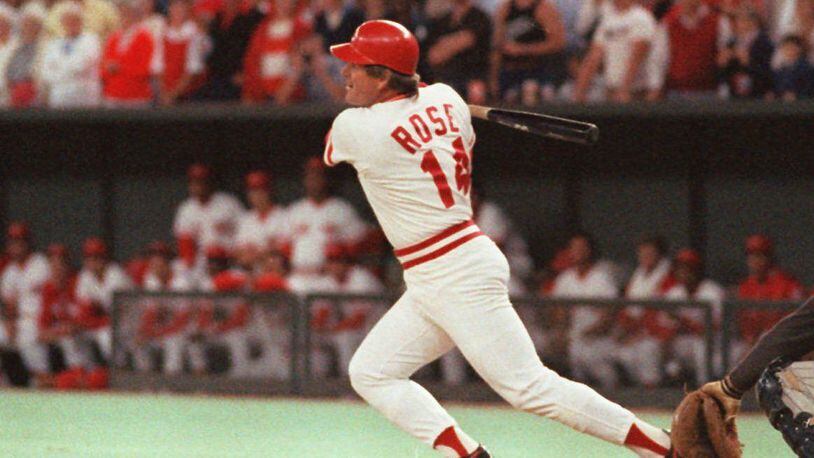 Cincinnati Reds Pete Rose hits a line drive, Sept.11,1985, in Cincinnati to break Ty Cobb's all-time hit record.