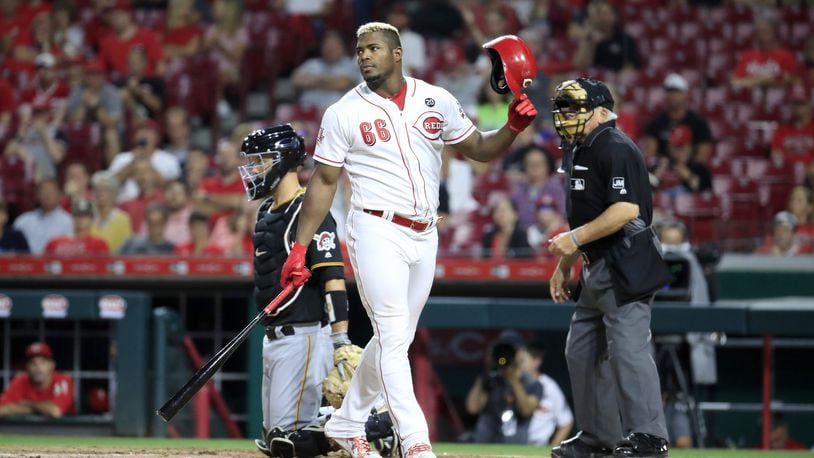 Yasiel Puig of the Cincinnati Reds disagrees with a called strike in the 8th inning against the Pittsburgh Pirates at Great American Ball Park on Tuesday, July 30 at Cincinnati. (Photo by Andy Lyons/Getty Images)