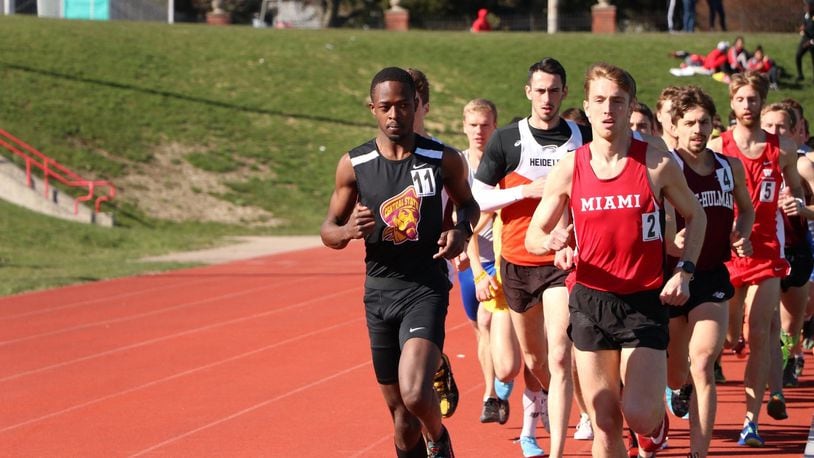Central State’s Emmanuel Birgen leads the pack during a race at the Miami Duals. CONTRIBUTED